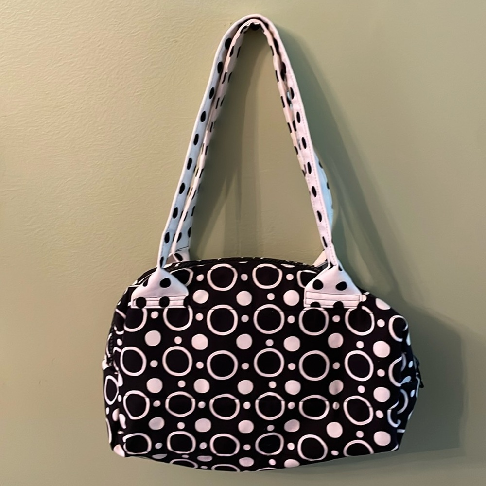 Etc. black and white cosmetic bag.